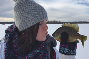 image of jo bellamy kissing bluegill