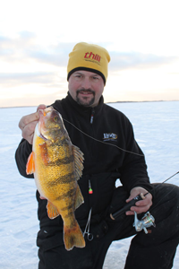 image of Jason Feldner holding Devils Lake Perch