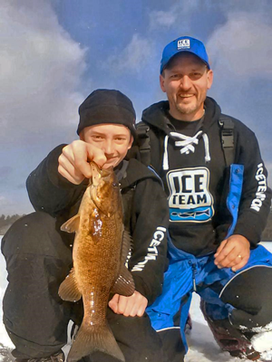 image of kevin dahlke with smallmouth bass