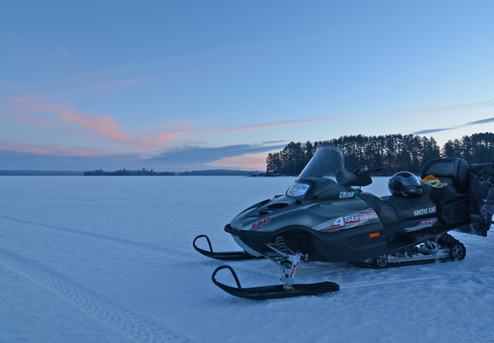 image of snowmobile at sunrise on Lake Kabetogama December 2018