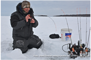 image of shane boeshart catching big walleye