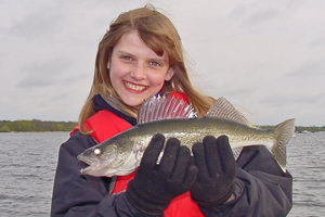 image of young lady with nice walleye