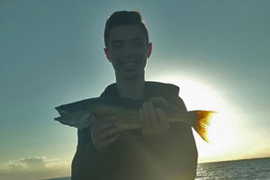 image of Crosby with walleye