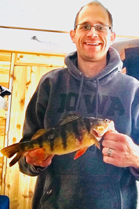 image of angler with big perch