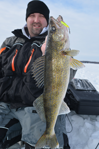 image of chris messerschmidt with mille lacs walleye