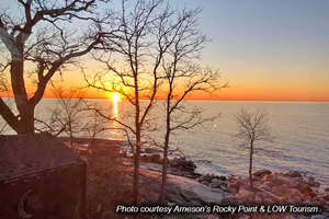 lake of the woods sunset at arnesons rocky point resort