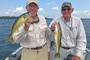 image of bill linder and friend louie with a nice walleye double