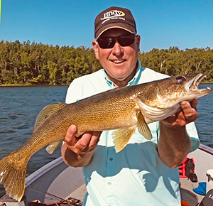 image of jeff sundin with big walleye