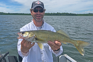 image of John Landsburg with nice walleye