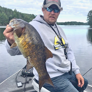 image of kent keeler with smallmouth bass