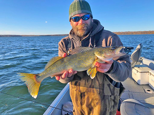 image of Chris Andresen with Winnie Walleye