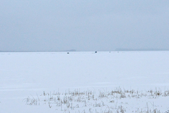 image of ice fishing shelters on Bowstring Lake