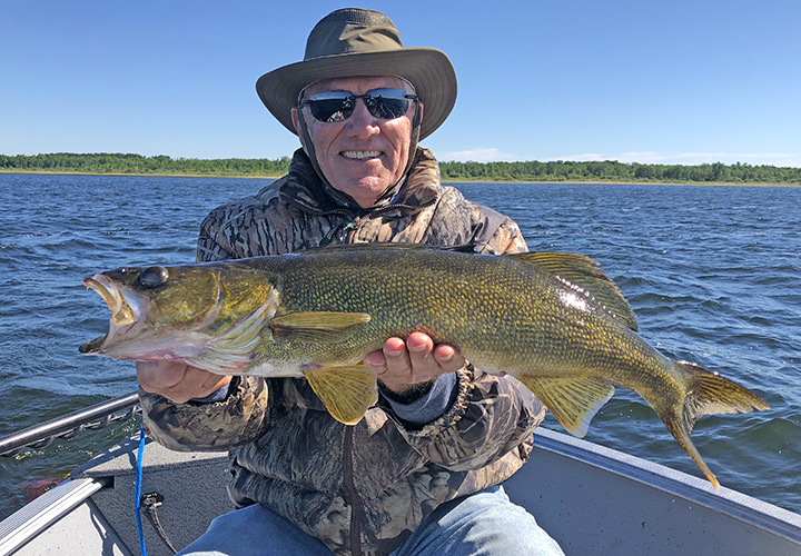 image of Jim Miller with big walleye