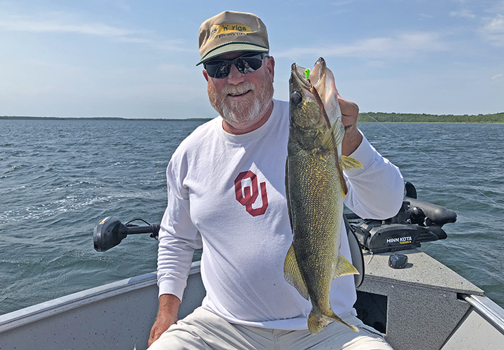 image of Larry Lashley with nice walleye caught using wiggle worms