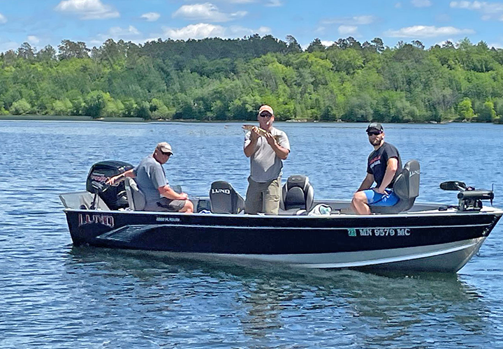 image of Al Heimer with walleye caught trolling spinners