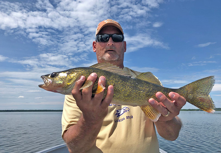 image of Al Heimer with nice walleye caught in the Deer River area