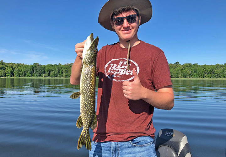 image of Adam Kleymann with nice size northern pike