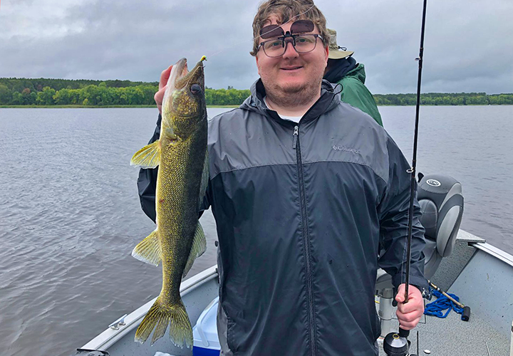 image of Clark with nice size walleye caught on Lake Winnibigoshish