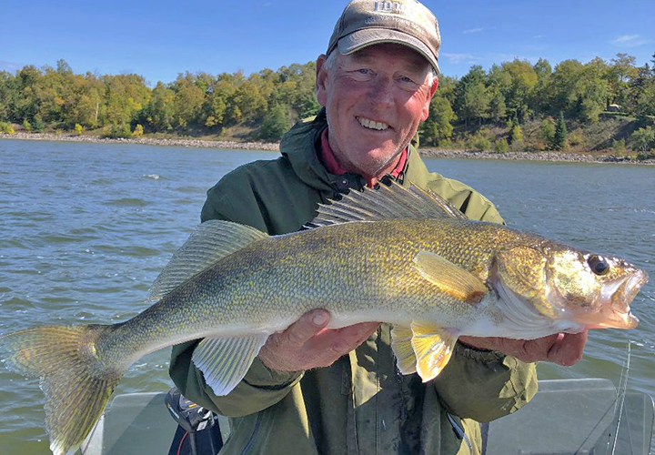 image of Lake Winnie Guide Jeff Sundin with big Walleye