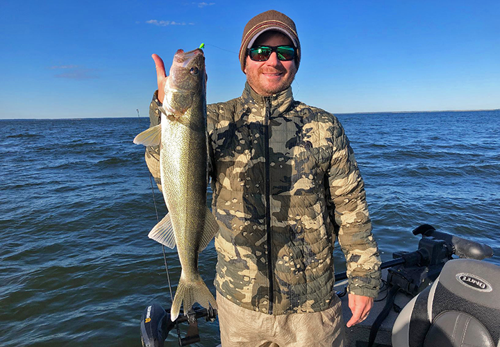 image of Nathan Milius with nice Lake Winnie Walleye