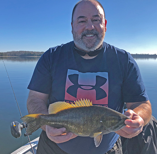 image of Greg with nice smallmouth bass