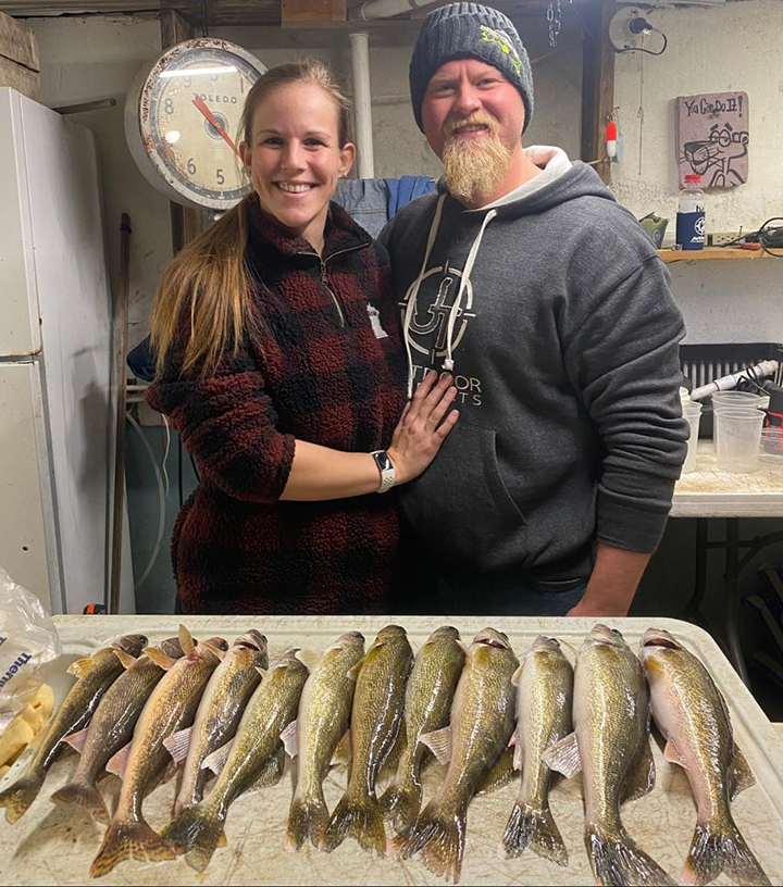 image of Charlie and Joslyn with nice limits of walleye caught on the Rainy River