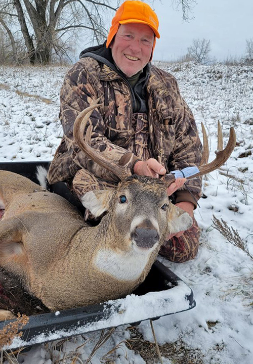 image of Jeff Sundin with nice buck deer bagged during the Minnesota Deer Hunting season.
