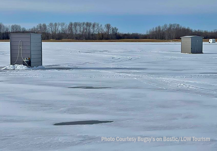image of ice fishing shelters on the ice at Bugsy's on Bostic