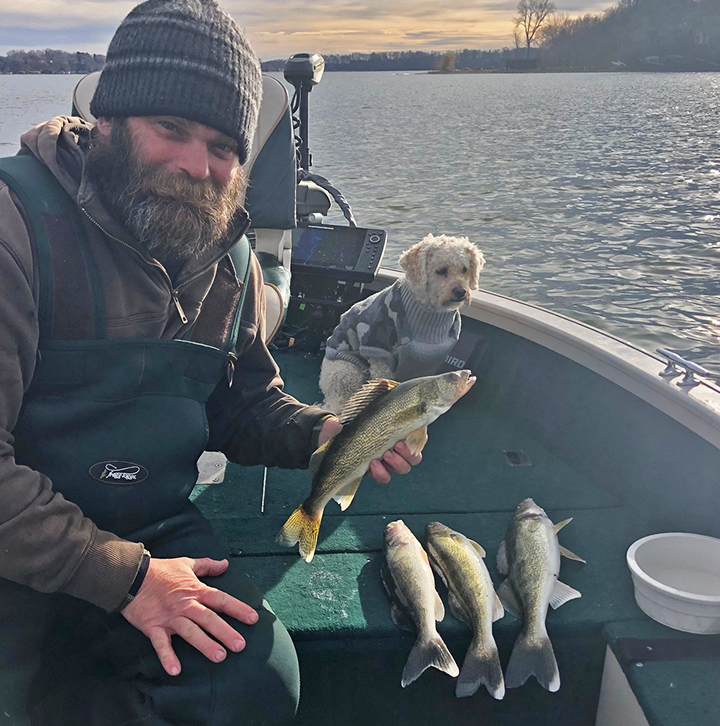 image of Chris Andresen with nice walleyes caught on open water december 1, 2021
