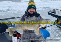 image of angler holding big walleye caught on Lake of the Woods