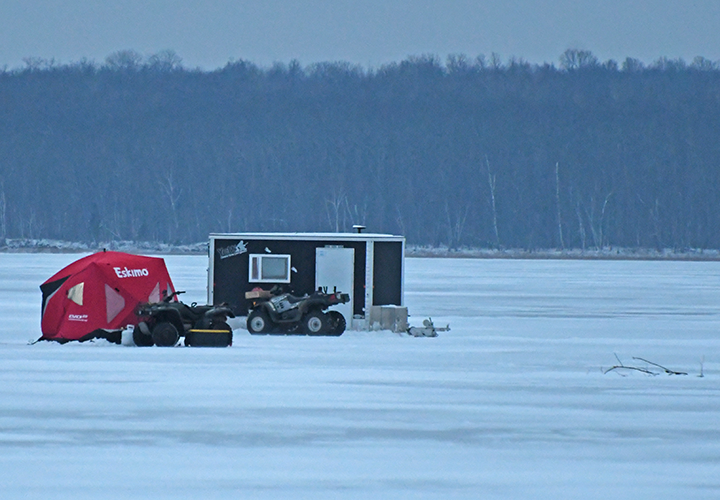 image of ice shelters on Grand Rapids area lake