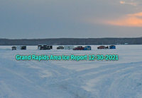image of ice fishing shelters and pickup trucks on Splithand Lake December 29, 2021