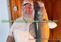image of walleye fisherman holding giant fish he caught on lake of the woods