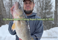 image of ice fisherman with big walleye caught in the Ely MN region