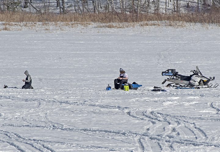 image of anglers fishing on the ice