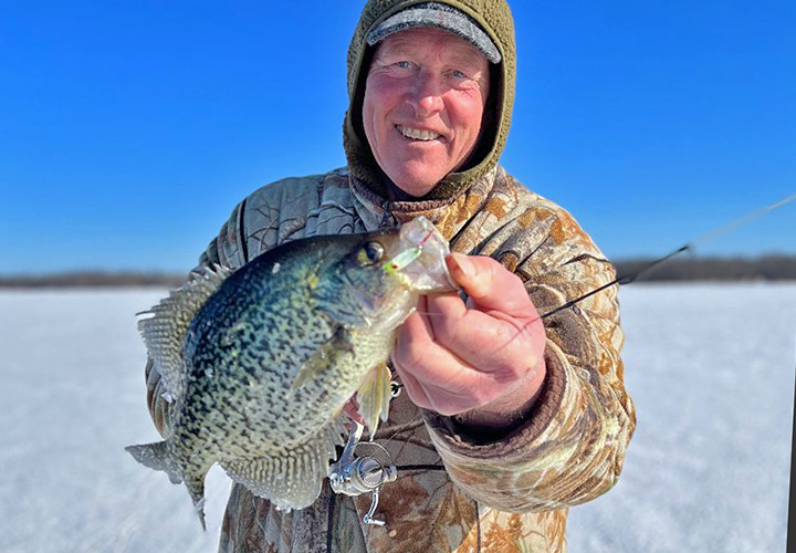 image of grand rapids fishing guide jeff sundin with nice size crappie