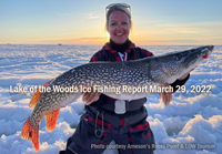image of woman holding big northern pike caught on Lake of the Woods 