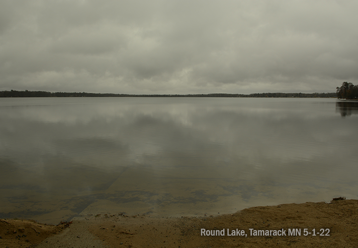 image of ice-free round lake near tamarack mn