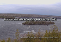 image of moose lake at Ely MN revealing cracked, soggy ice
