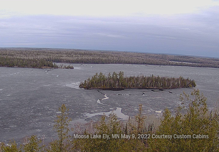 image of moose lake at Ely MN revealing cracked, soggy ice