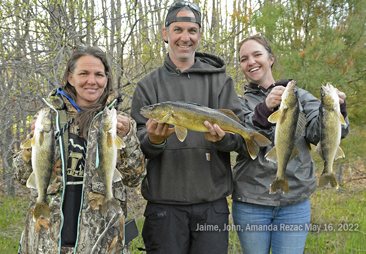 image of Jaime, John and Amada Rezac with nice Bowstring Lake Walleyes