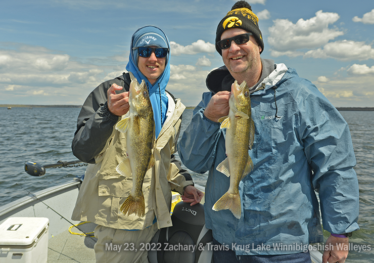 image of Zachary and Travis Krug with a pair of nice size walleyes caught on Lake Winnie