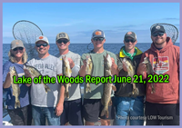 image of 6 person fishing party showing their catch after lake of the woods charter trip