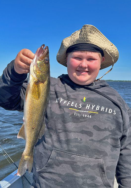 image of Brice Demuth with nice walleye