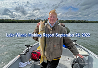 image of Karen Reynolds with big walleye caught on Lake Winnie