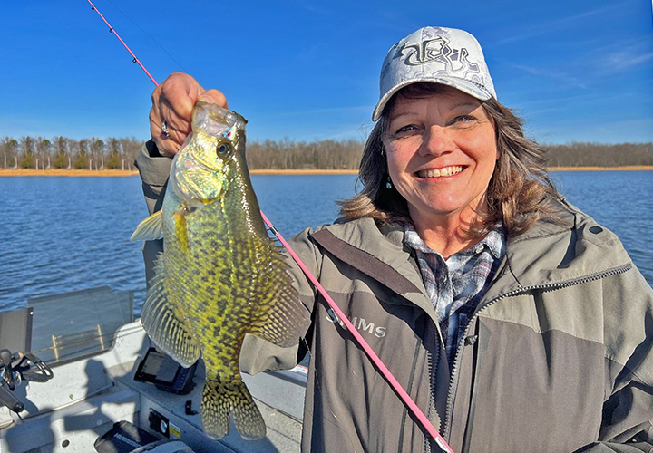image of the Hippie Chick holding big crappie