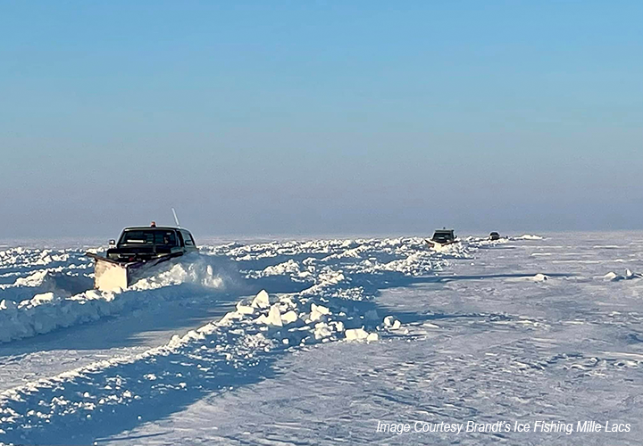 image of trucks plowing snow on Lake Mille Lacs