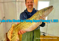 image of ice fisherman holding giant eelpout caught at the Northwest Angle