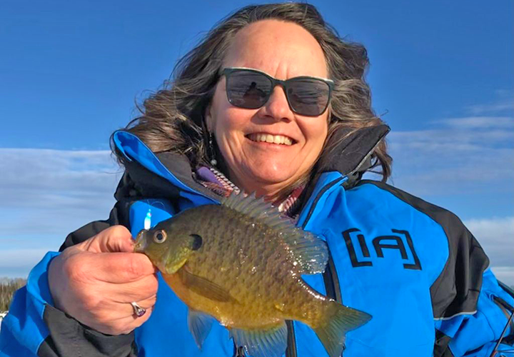 image of the Hippie Chick holding nice bluegill