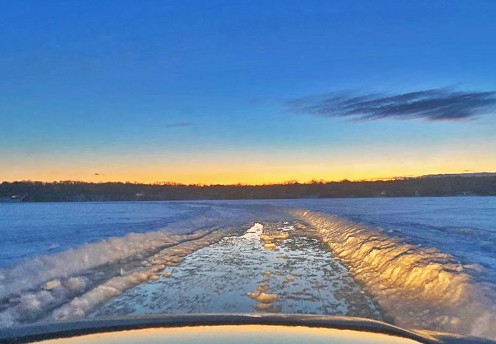 image of slushy ice road on Grand Rapids Area Lake